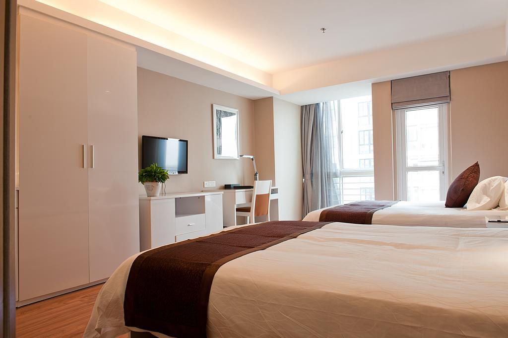 Days Inn Qixiu Nantong Rum bild
